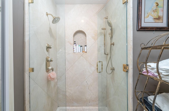 full bathroom featuring a stall shower