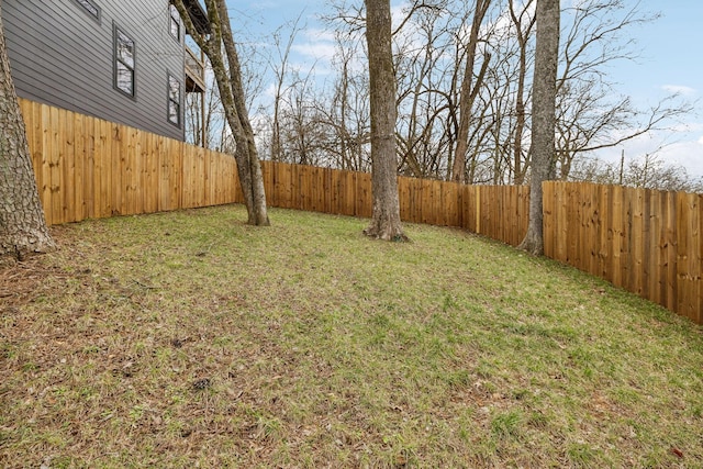 view of yard featuring a fenced backyard