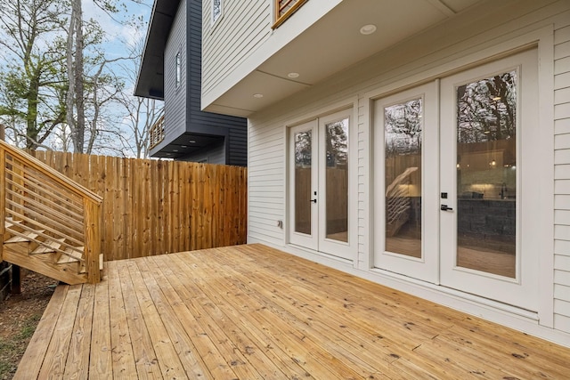 deck with fence and french doors