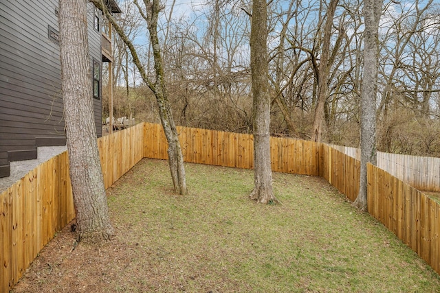 view of yard featuring a fenced backyard