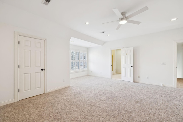 carpeted empty room with recessed lighting, visible vents, baseboards, and ceiling fan