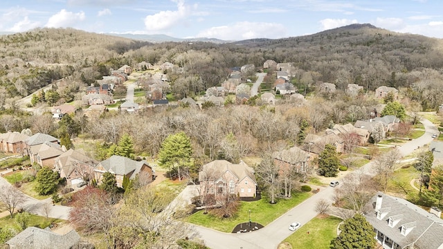 birds eye view of property featuring a mountain view and a residential view