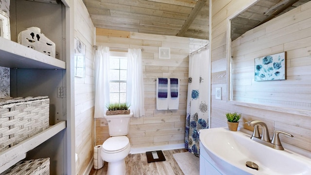 bathroom with wood walls, wooden ceiling, wood finished floors, and toilet