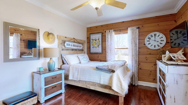 bedroom with wood walls, wood finished floors, and crown molding