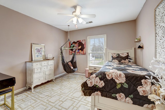 bedroom featuring visible vents, ceiling fan, and baseboards