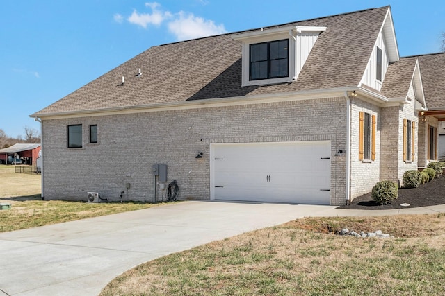 view of property exterior featuring concrete driveway, brick siding, and a shingled roof