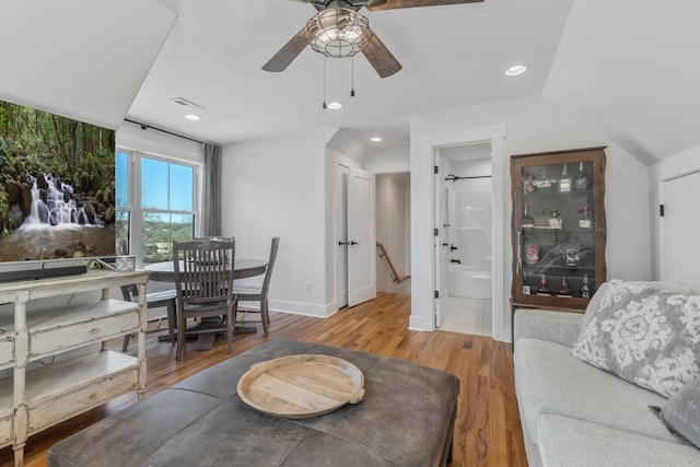 living area with recessed lighting, visible vents, ceiling fan, wood finished floors, and baseboards