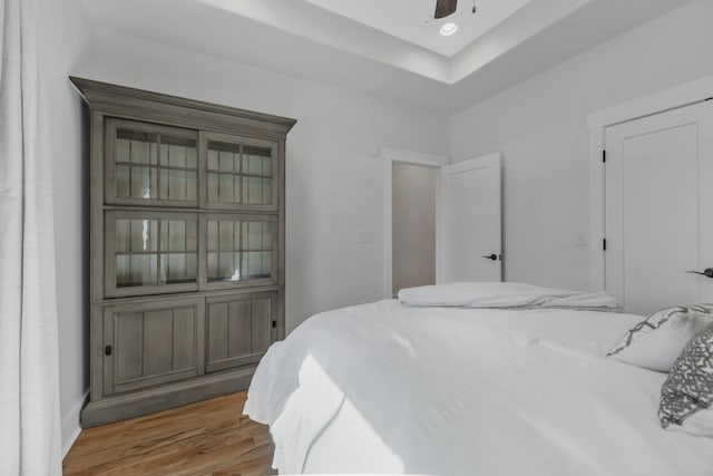 bedroom with a ceiling fan, recessed lighting, and light wood finished floors