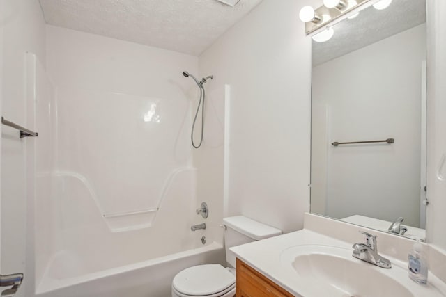 full bath with a textured ceiling, tub / shower combination, vanity, and toilet