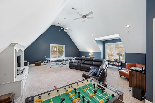 game room featuring visible vents, lofted ceiling, and carpet floors