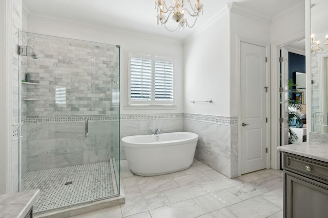 bathroom featuring a chandelier, marble finish floor, a stall shower, and vanity