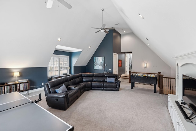 game room featuring light carpet, high vaulted ceiling, and ceiling fan