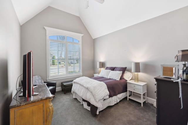 bedroom with lofted ceiling, baseboards, dark carpet, and ceiling fan