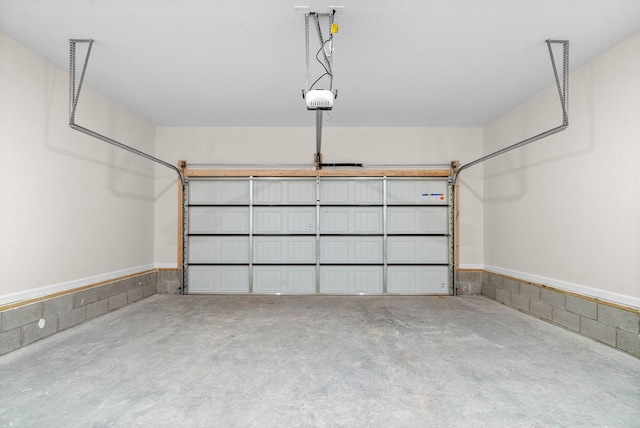 garage featuring a garage door opener