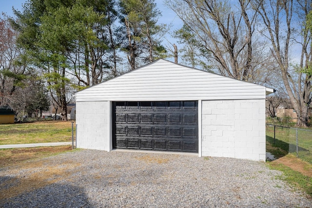 detached garage with fence