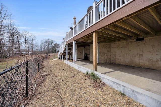 view of yard featuring stairway and a deck