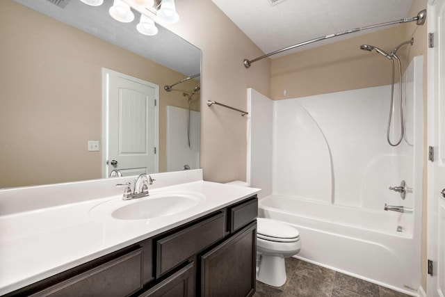 full bathroom featuring a textured ceiling, vanity, toilet, and shower / bathtub combination