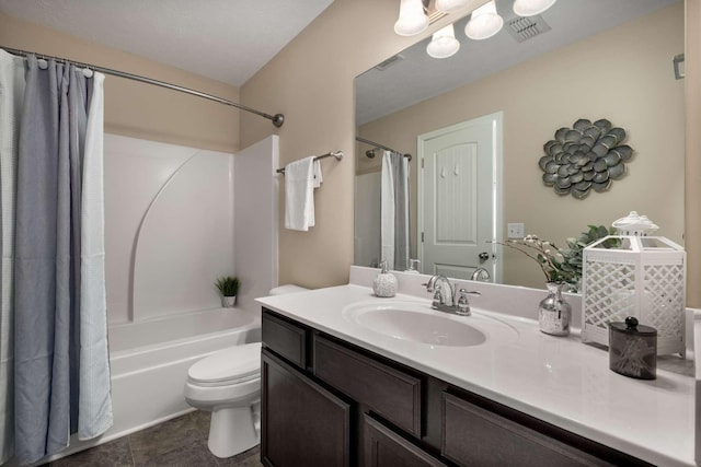 bathroom featuring visible vents, toilet, shower / tub combo, vanity, and tile patterned floors