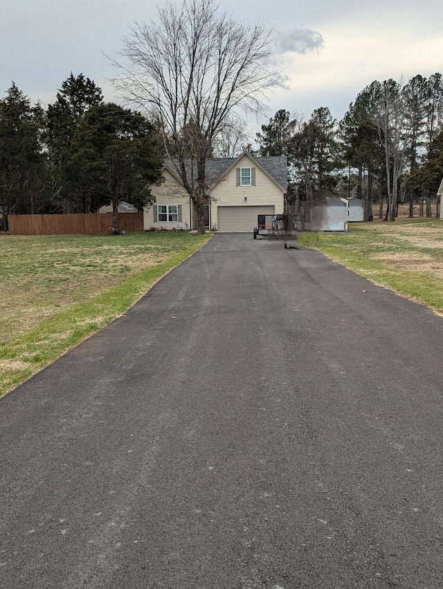 view of road with driveway