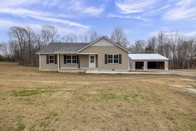 view of front of home with an outbuilding, a porch, a shingled roof, a detached garage, and crawl space