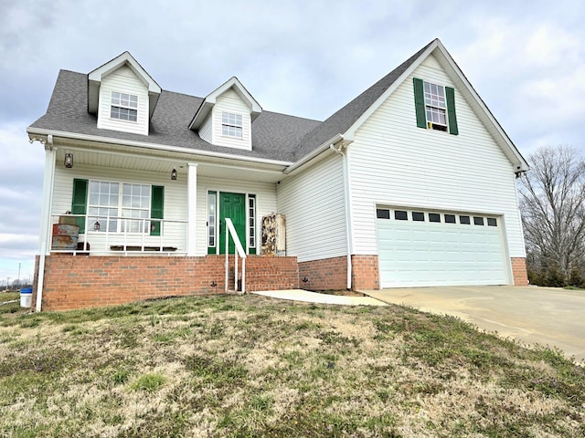 view of front facade featuring a garage, covered porch, driveway, roof with shingles, and a front lawn