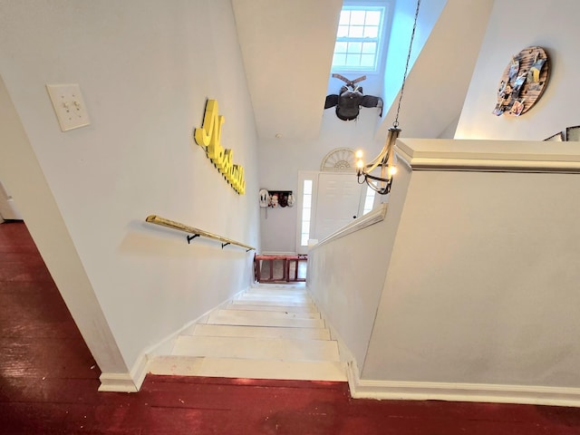 stairway with a towering ceiling