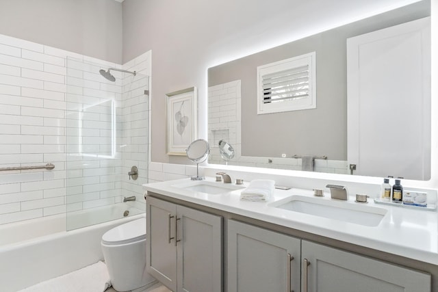 full bath with shower / washtub combination, a sink, toilet, and double vanity