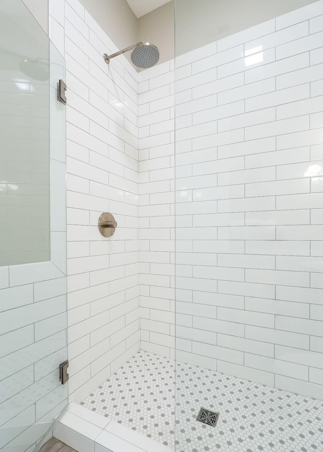 full bathroom with a shower stall