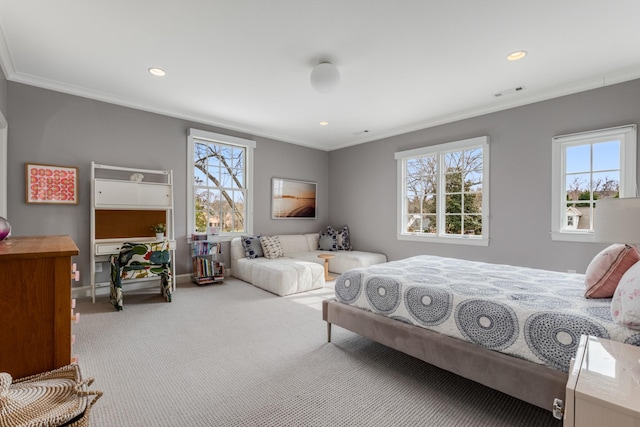 bedroom featuring multiple windows, carpet flooring, and crown molding