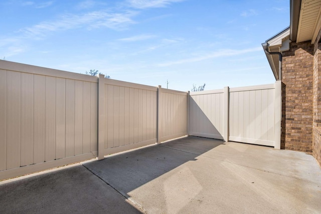 view of patio featuring fence