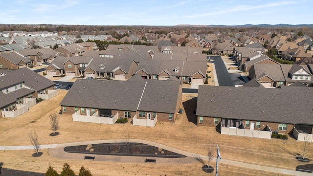 birds eye view of property with a residential view