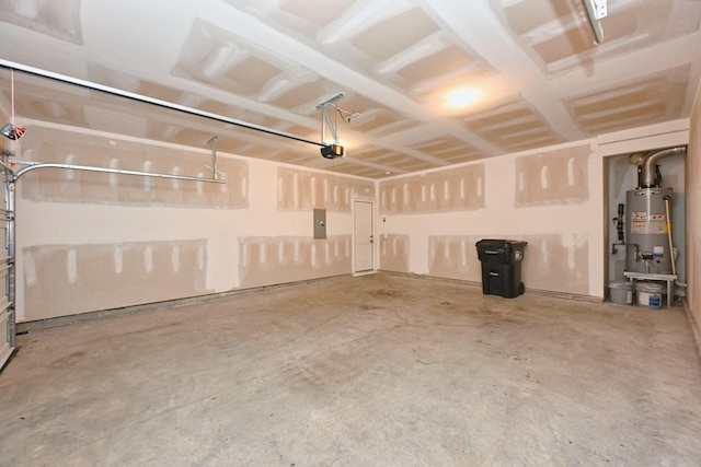 garage with electric panel, gas water heater, and a garage door opener