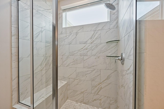 full bath featuring a shower stall