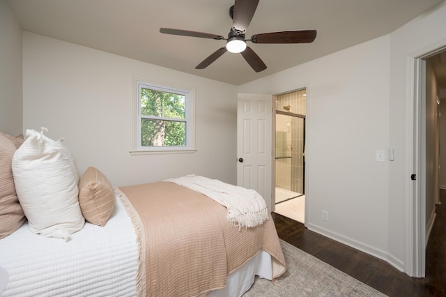 bedroom with ensuite bathroom, ceiling fan, wood finished floors, and baseboards