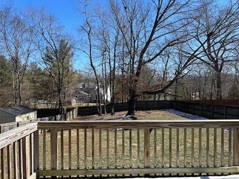 wooden deck featuring fence