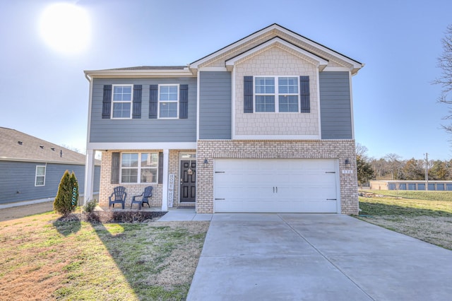 view of front of house with a front yard, brick siding, concrete driveway, and an attached garage