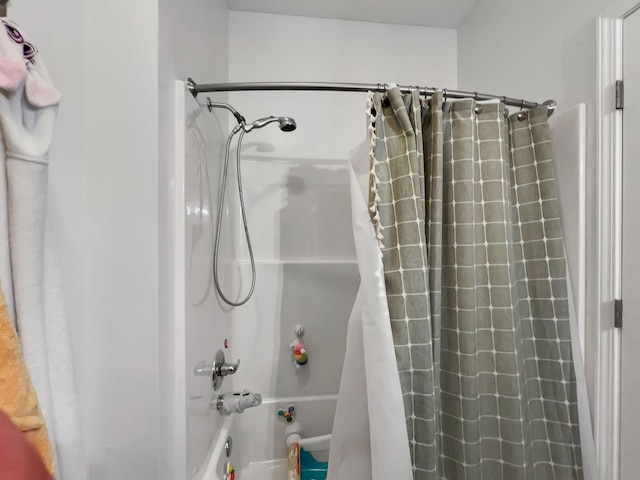 bathroom featuring shower / bath combo