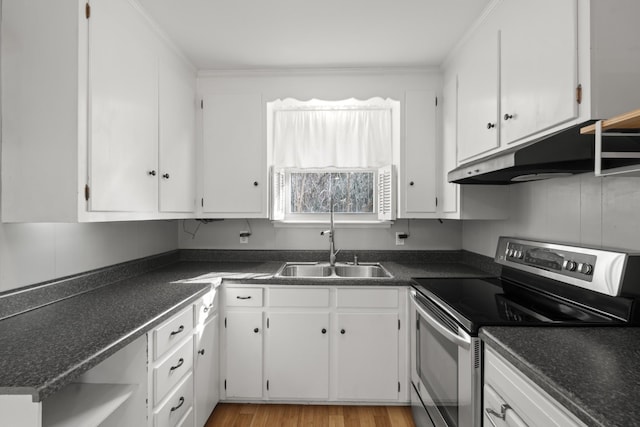 kitchen with under cabinet range hood, stainless steel electric stove, white cabinets, and a sink