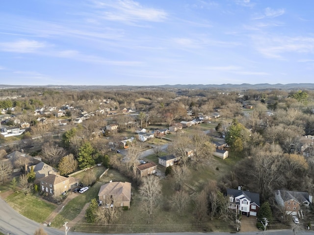 birds eye view of property featuring a mountain view and a residential view