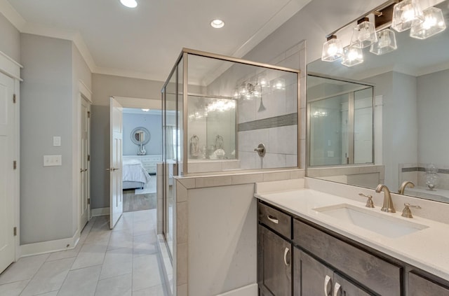 full bathroom with ornamental molding, a stall shower, vanity, and tile patterned floors