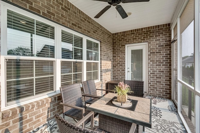 sunroom / solarium with ceiling fan