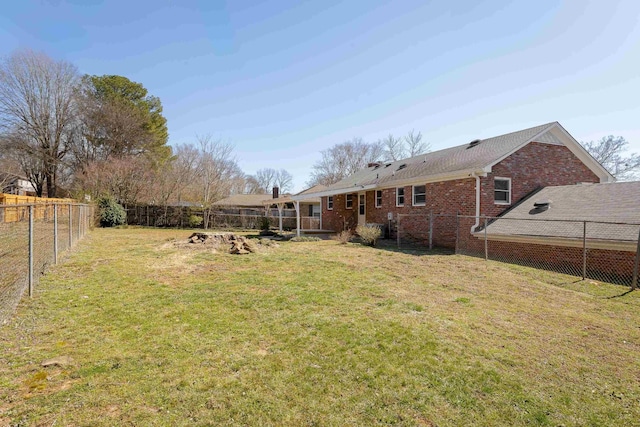 view of yard featuring a fenced backyard