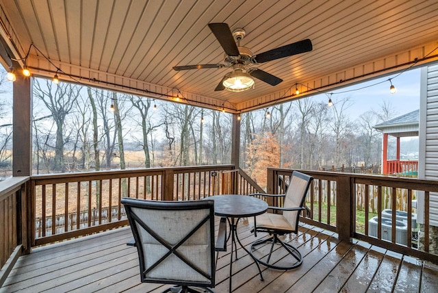 wooden deck with ceiling fan