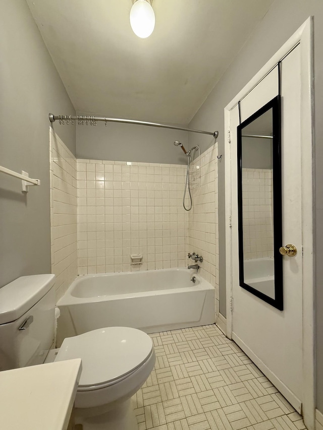 full bathroom featuring toilet, tub / shower combination, and vanity