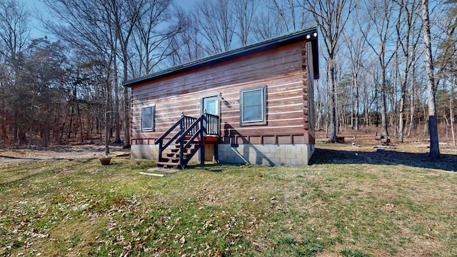 exterior space featuring a front lawn