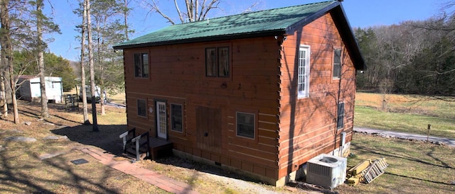 view of outdoor structure with central air condition unit and an outdoor structure