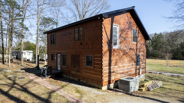 view of property exterior featuring central AC