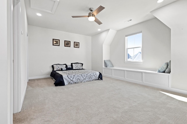 bedroom featuring attic access, recessed lighting, light carpet, and visible vents
