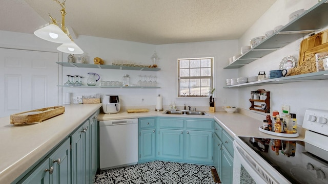 kitchen with open shelves, light countertops, a sink, a textured ceiling, and white appliances