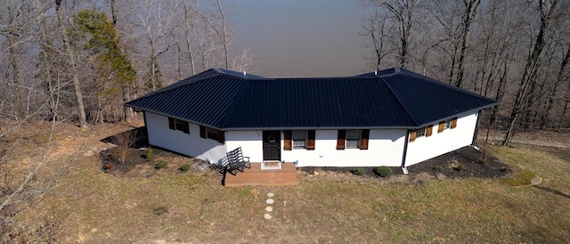 view of front of house featuring metal roof